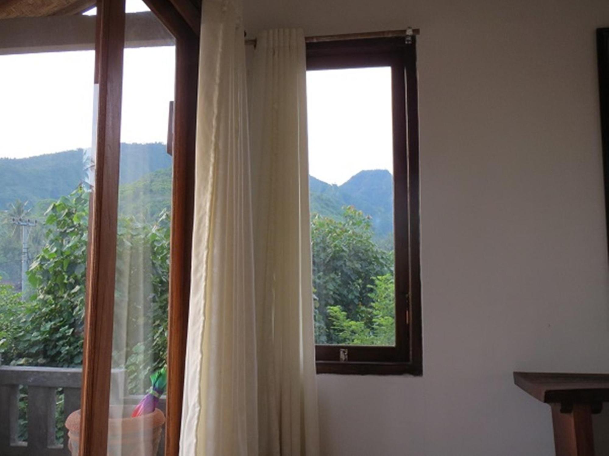 Bali Sari Homestay Амед Номер фото